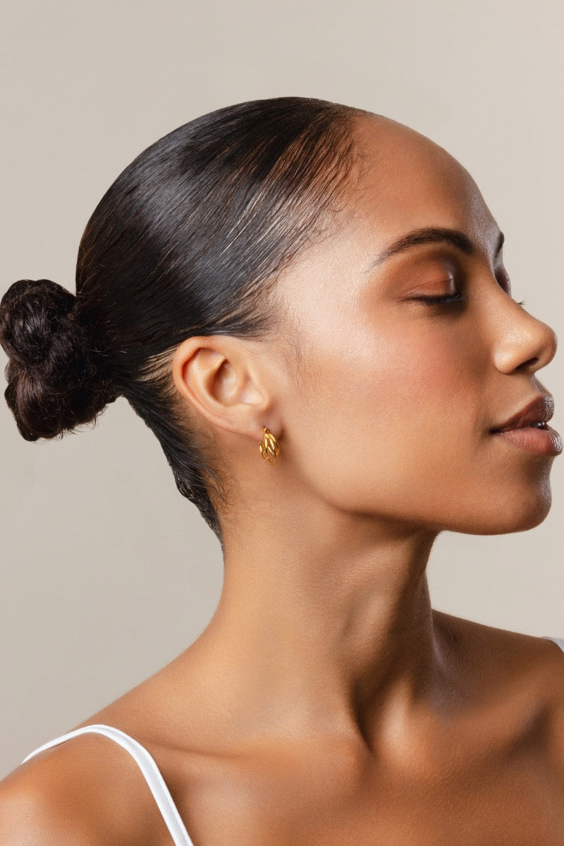 DANI yellow gold vermeil earrings by Sara Shala featuring elegant, lightweight hoop design with a polished finish.