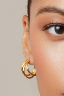 Close-up of Sara Shala Dani Maxi Earrings in yellow gold vermeil, showcasing their elegant, bold design and shiny finish.
