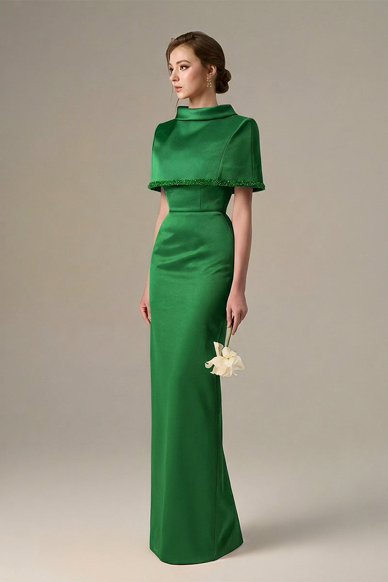 Dark green taffeta maxi dress with a cropped cape and inverted lapel by I.H.F, showcasing elegant evening style.