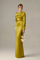 Dark yellow satin silk gown by I.H.F with long sleeves, draped back neckline, and tie detail for elegant evening wear.