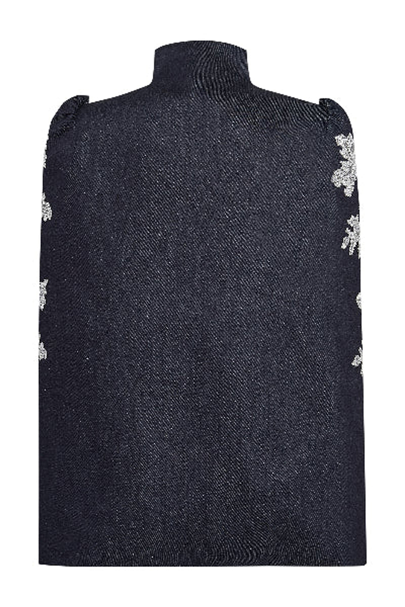 Nadya Shah IRIS denim cape jacket shown from the back in dark denim with wide sleeves and stylish design.