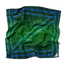 Silk scarf by Amel Batita featuring the DARQ BROCOT design, with intricate patterns and vibrant colors, perfect for stylish accessories.