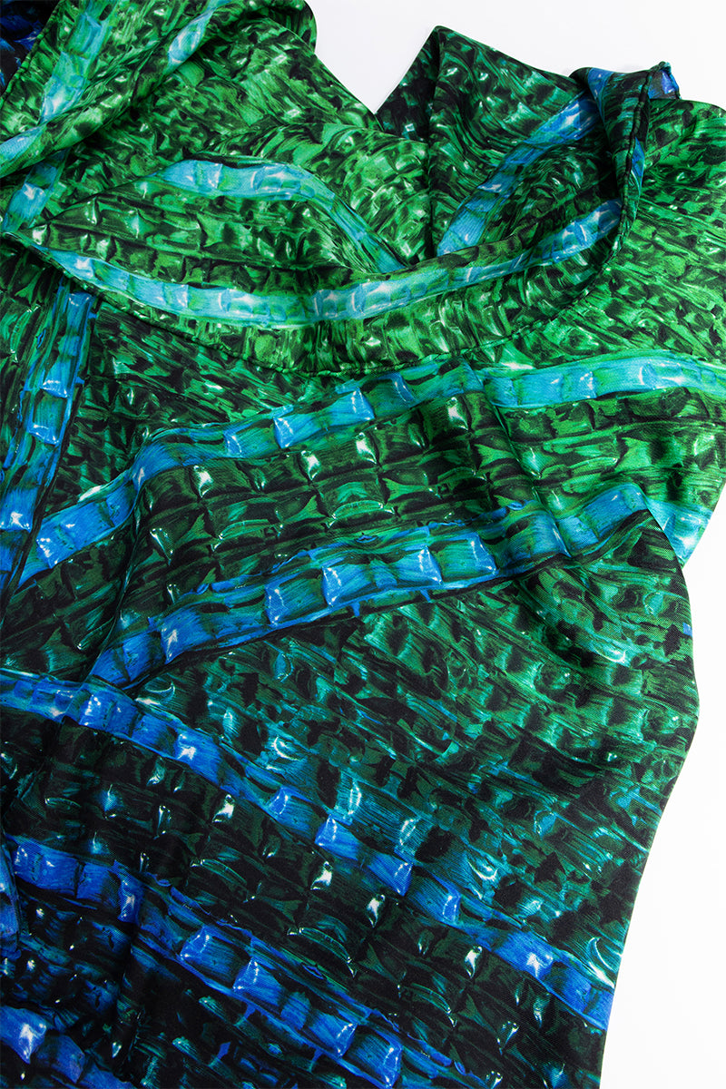 Silk Darq Brocot scarf by Amel Batita featuring intricate geometric patterns and elegant draping.