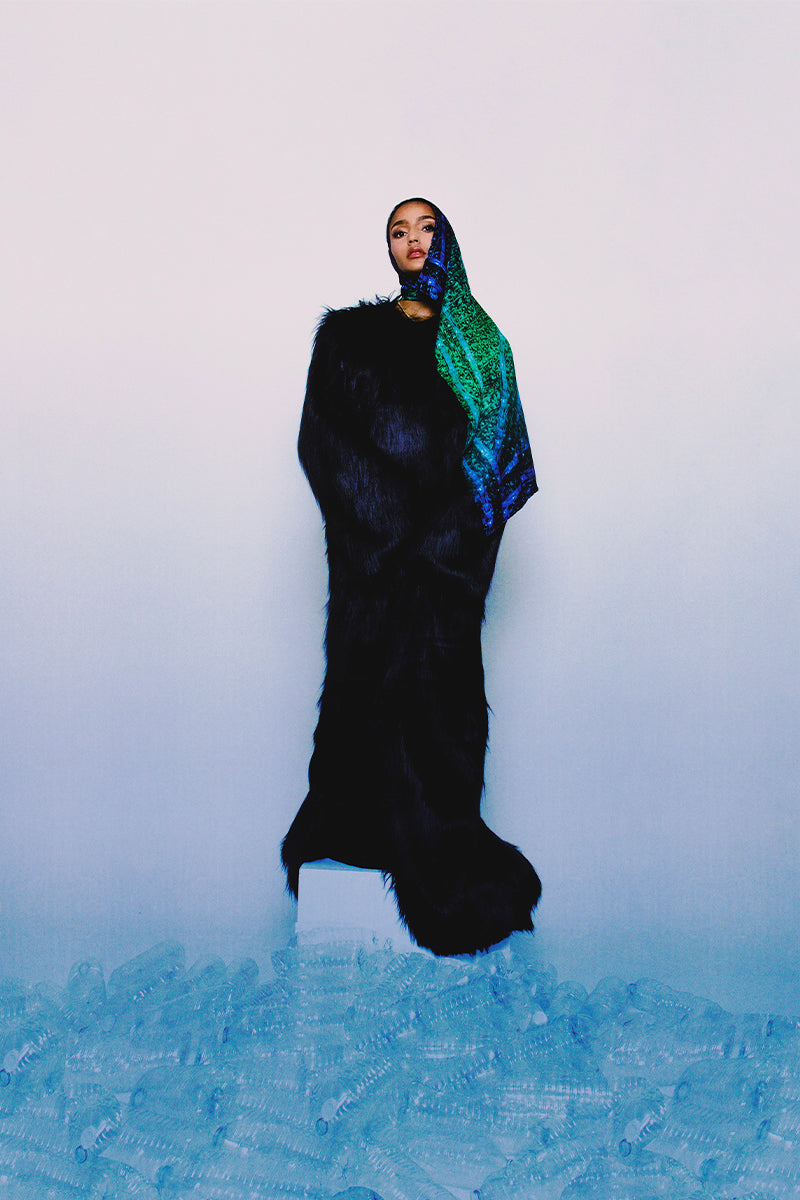 Amel Batita Darq Brocot silk scarf featuring intricate patterns, styled as a 90-inch headscarf, showcasing luxurious fabric and design.