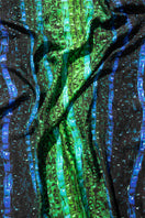 Close-up of Amel Batita DARQ Brocot silk stole showing intricate brocot pattern and luxurious fabric detail.