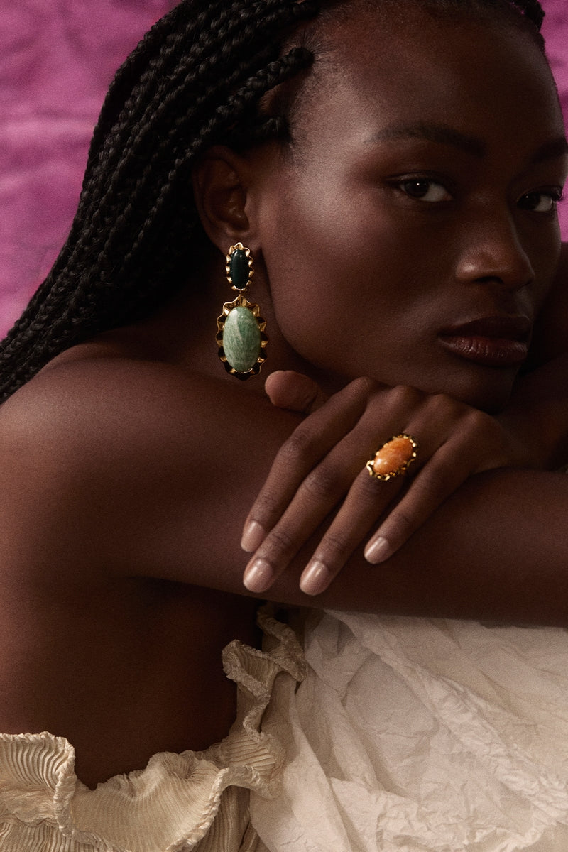 Elegant gold DELA ring by Maria Frering featuring a sleek, minimalist design perfect for stylish accessories.