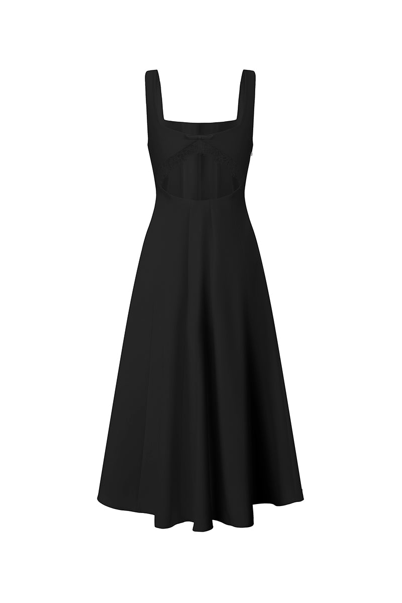 Nana Jacqueline Delilah black midi dress with cut-out design, shown from the back on a model with a stylish silhouette.