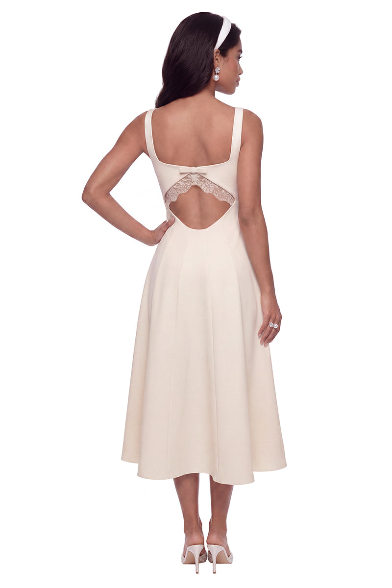 Nana Jacqueline white Delilah midi dress with cut-out details, elegant and stylish for special occasions.