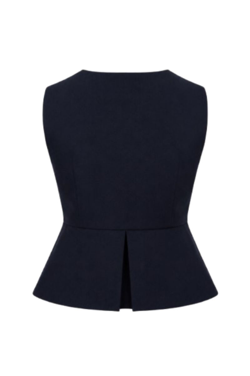 Navy blue Della top by ANA + MARIA displayed on a ghost mannequin, showcasing its fitted design and smooth fabric.