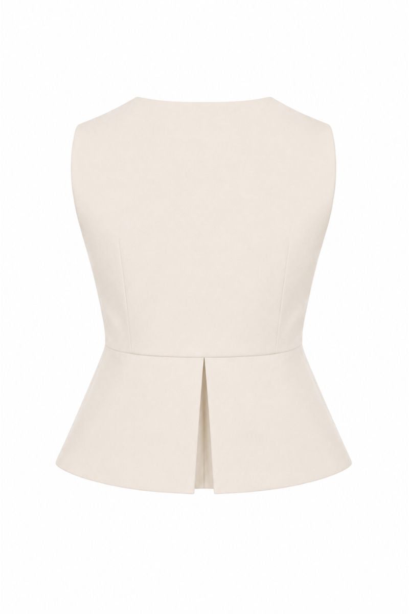 Sand-colored Della Top by ANA + MARIA displayed on a ghost mannequin, showcasing its stylish sleeveless design.