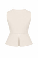 Light beige Della top by ANA + MARIA displayed on a ghost mannequin, showcasing its relaxed fit and soft fabric.