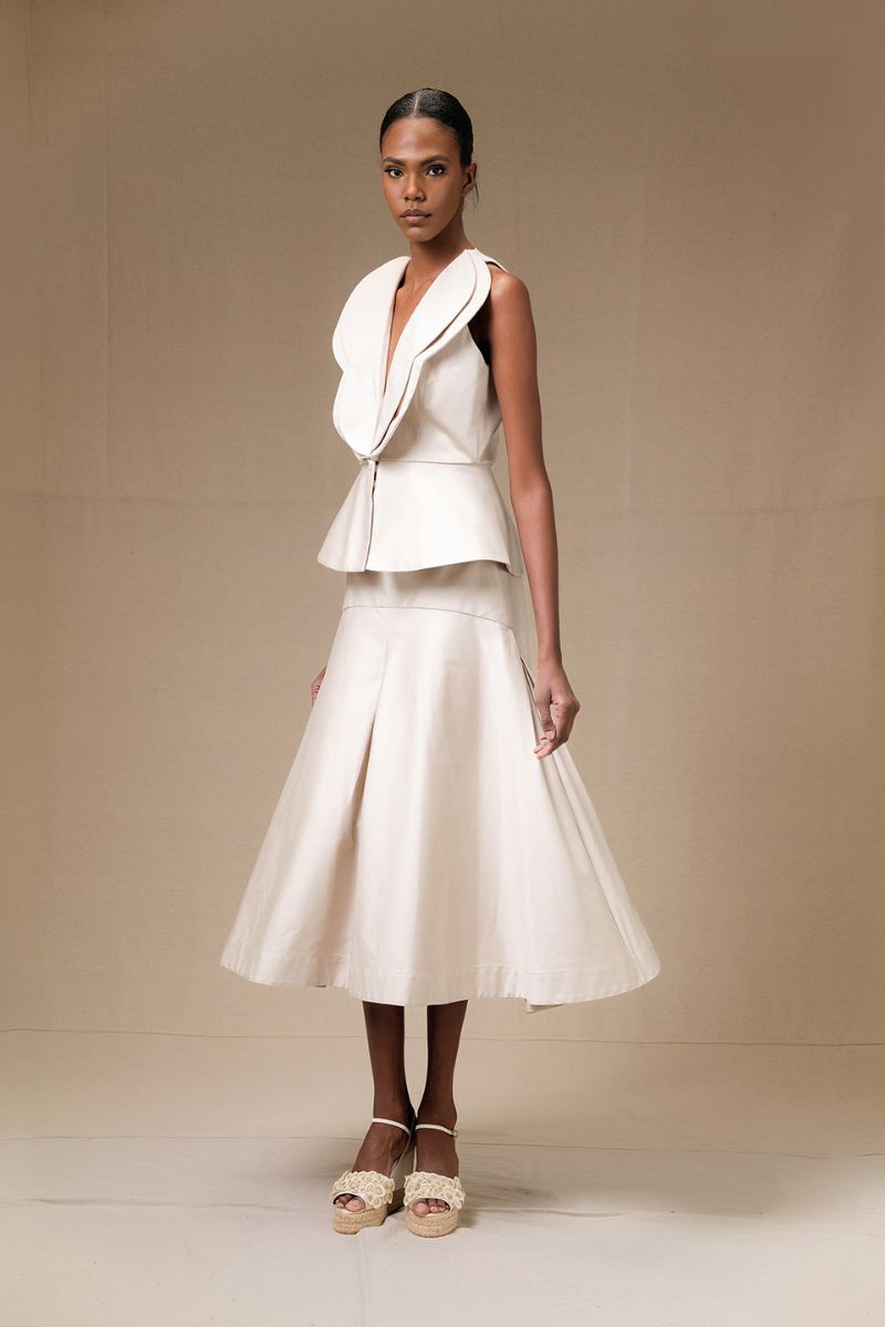 Beige Della Top by ANA + MARIA, casual sleeveless blouse with a relaxed fit, displayed on a neutral background.