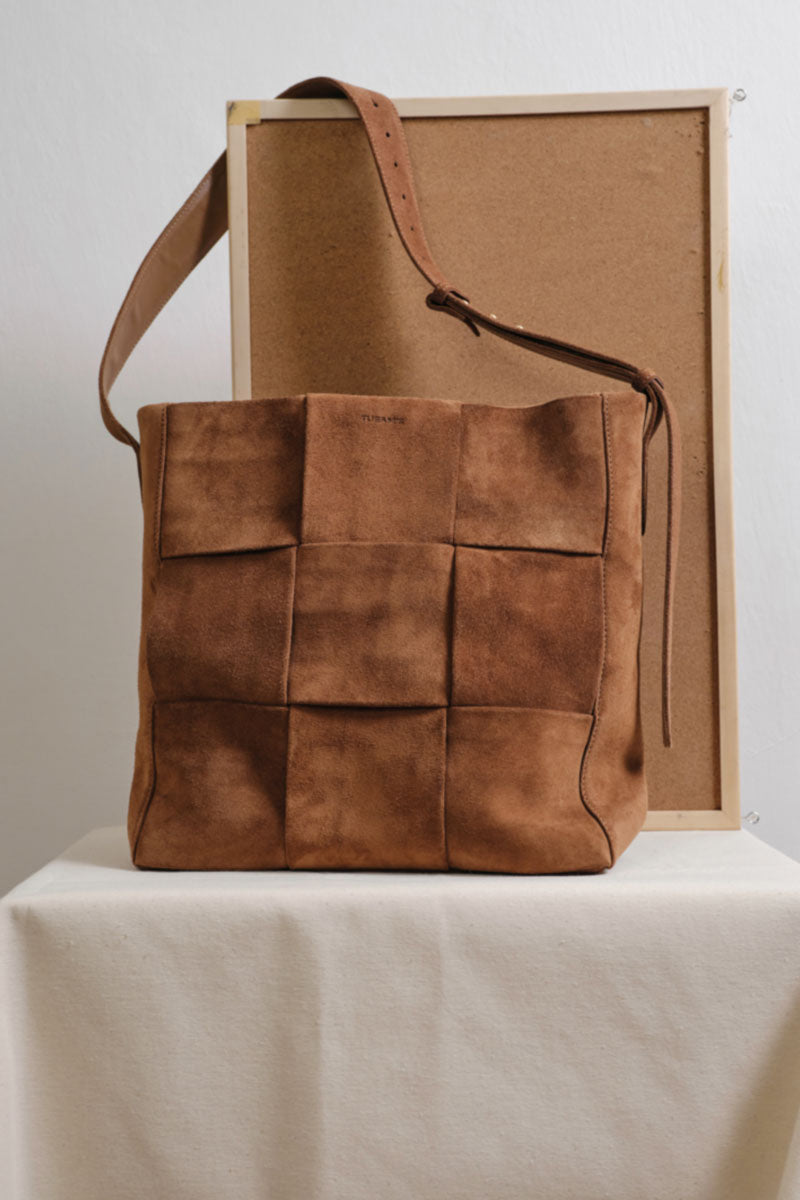 Light brown suede Della shopper shoulder bag by TUEAM'S with spacious interior and stylish design.