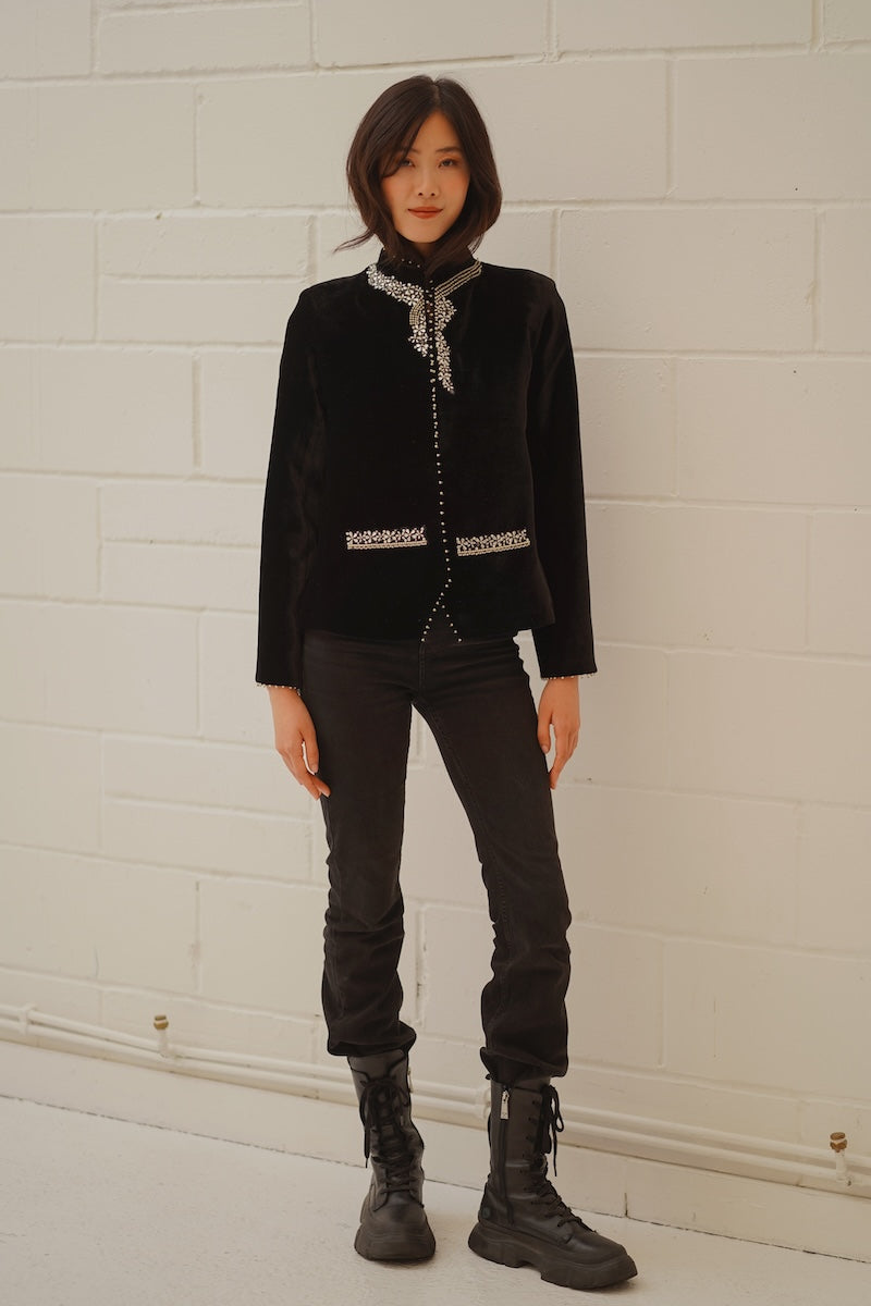 Nadya Shah Delphine velvet jacket featuring a tailored fit and luxurious fabric with a stylish collar and button details.