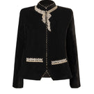 Nadya Shah Delphine velvet jacket displayed on a mannequin, front view showcasing luxurious fabric and tailored fit.