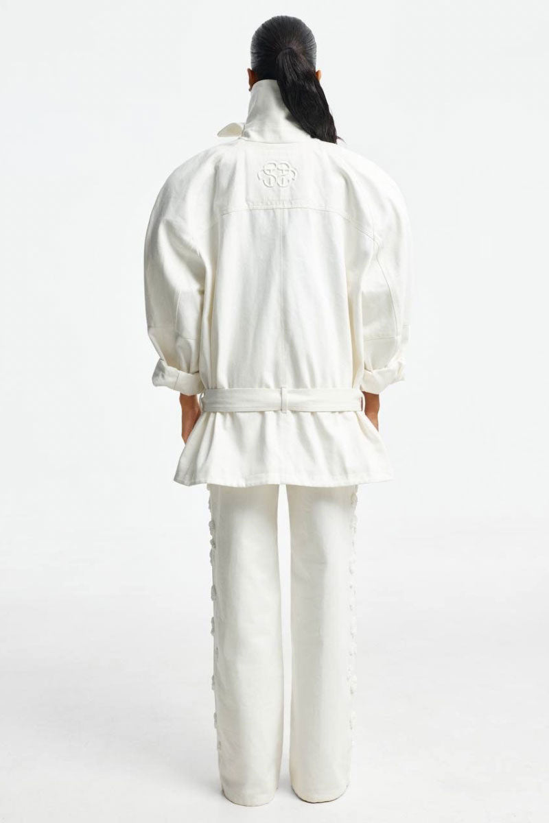 White denim jacket from Santa Brands, stylish casual outerwear with classic stitching and button details.