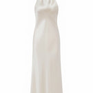 Cream silk satin halter-neck maxi dress by Serenity, featuring a flowing silhouette and elegant design.