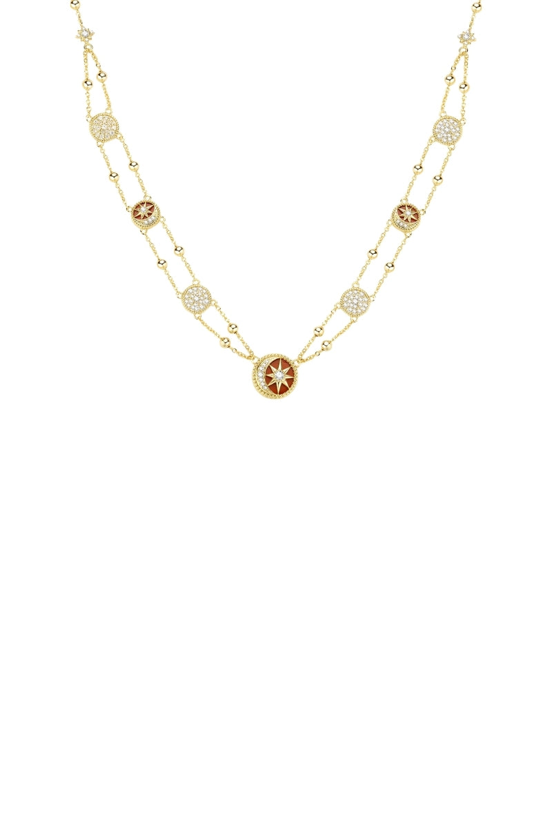 Golden Desert Tale Necklace by Velvet Desert featuring intricate desert-inspired pendant on a delicate chain.