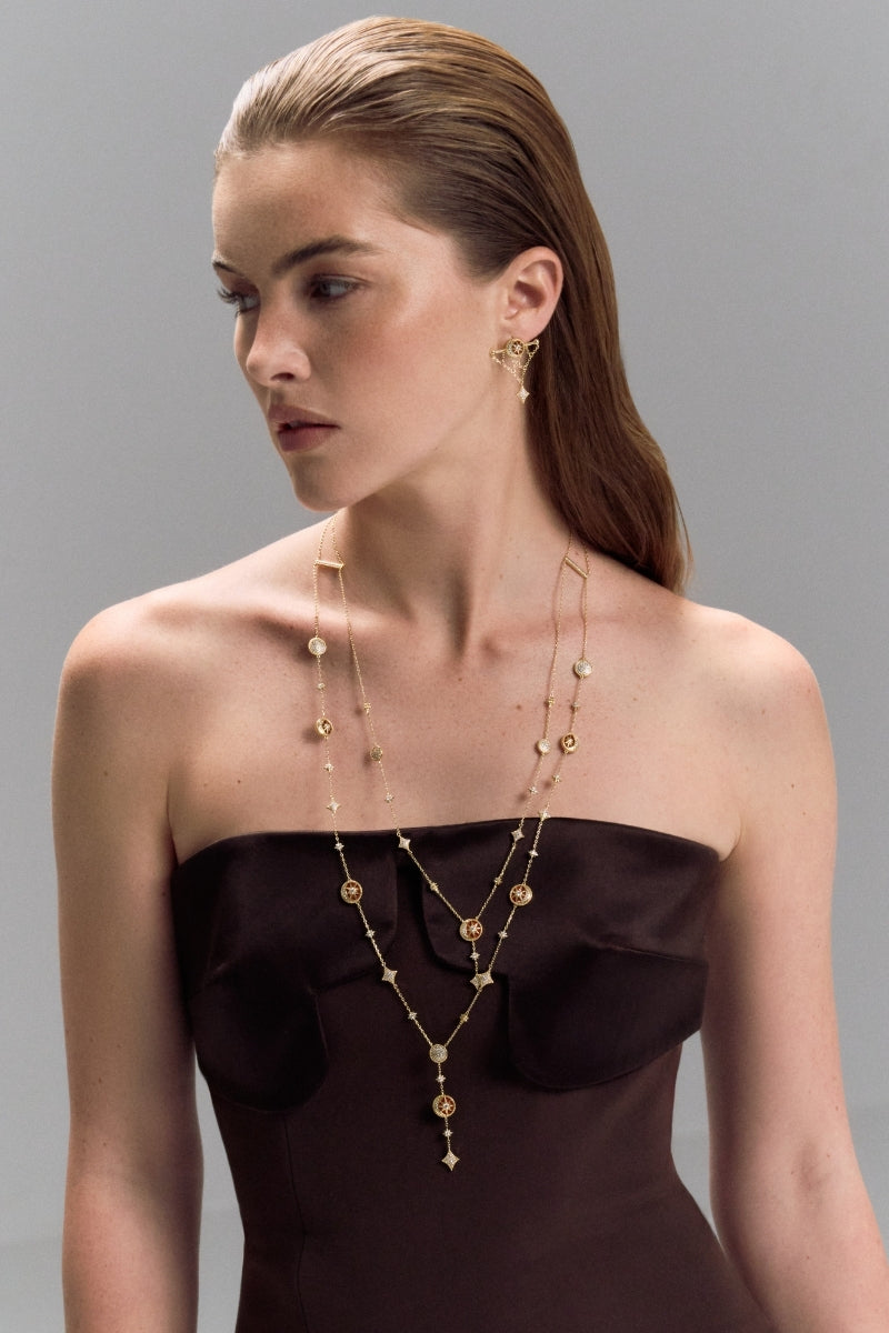 Gold desert tale net earrings by Velvet Desert featuring intricate net design with desert-inspired motifs.
