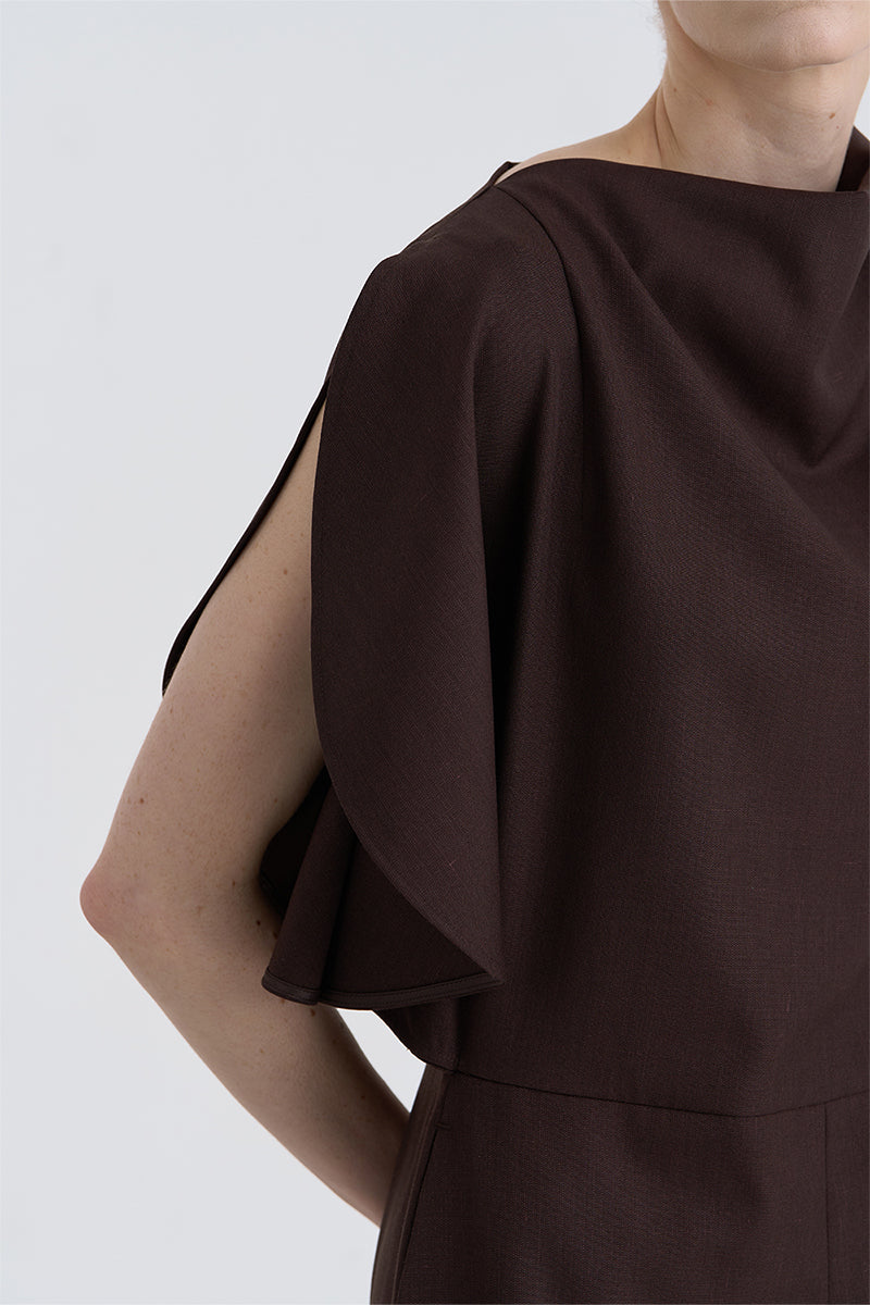 Close-up of the JINSUN Filante wool brown jumpsuit showing textured fabric and detailed stitching.