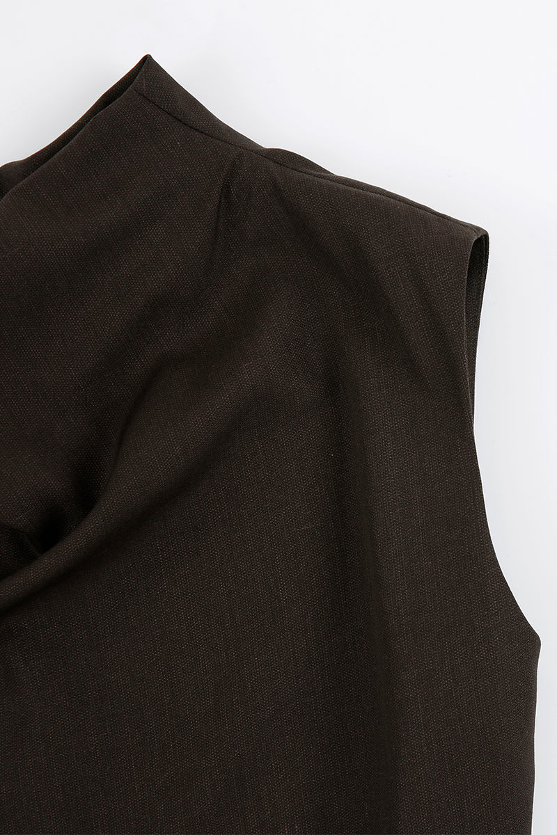 Close-up of JINSUN FILANTE wool brown jumpsuit showing textured fabric and stylish design details.