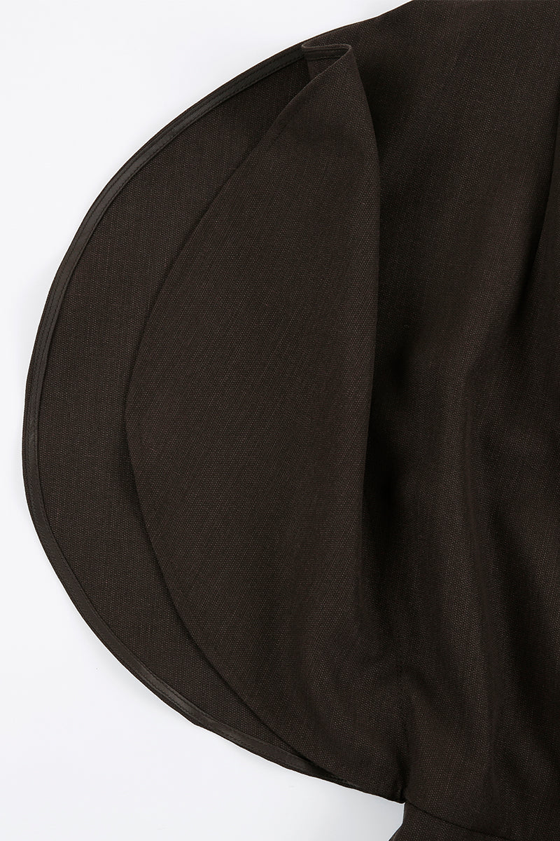 Close-up of JINSUN Filante wool brown jumpsuit showing fabric texture and tailored design details.