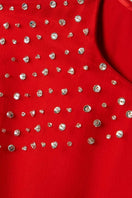 Red silk chiffon kaftan gown by SemSem with flowing fabric and intricate details, perfect for elegant occasions.