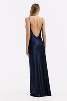 Navy silk-satin maxi dress with low back design from Serenity, flowing fabric and elegant silhouette, shown from the back.