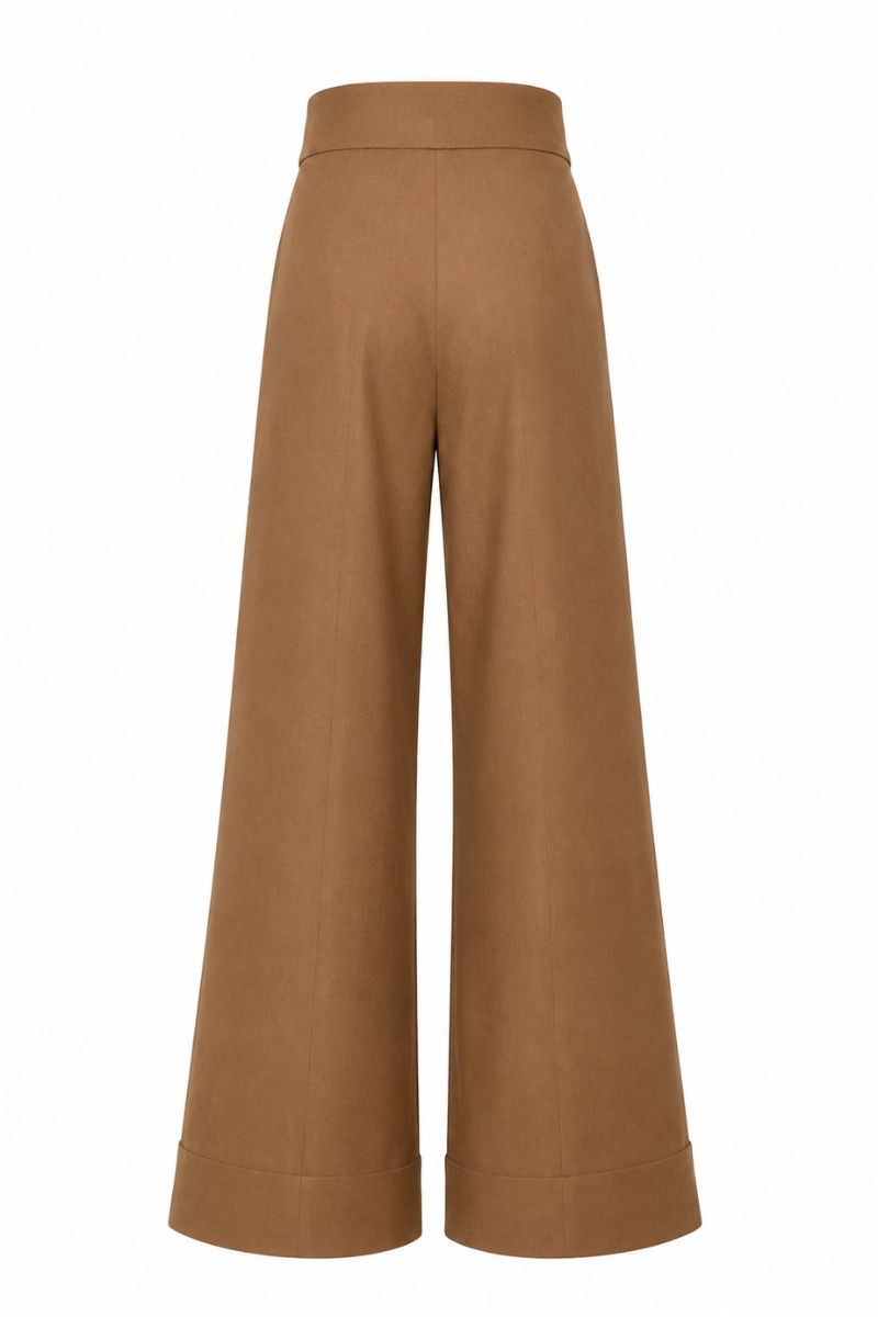 ANA + MARIA PINO tan pants, showing the stylish design and fit of these trendy casual trousers.