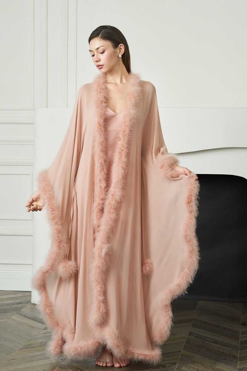 Manito Diva women's feather long robe in coral, soft and flowing with feather details, perfect for comfortable, elegant loungewear.