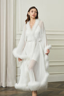 White Diva women's feather long robe by MANITO, soft and flowing with feathered detailing, perfect for luxurious loungewear.