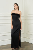 Black Diva women's feather strapless gown by MANITO, featuring elegant feather details and a fitted, floor-length design.