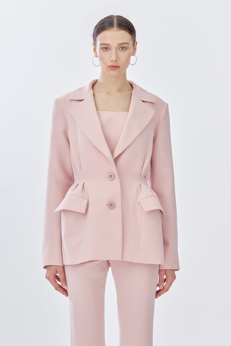 Pink doll suit jacket from Stolen Stores, shown front view with tailored fit and stylish design for jackets.