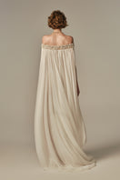 White POEM Douceur Maxi Dress shown on model, flowing fabric, elegant design, perfect for summer occasions.