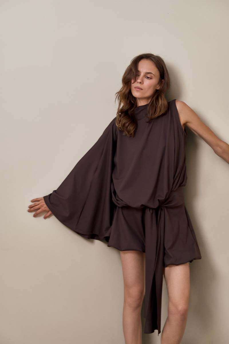Close-up of YASSMIN SALEH brown drape top showing soft fabric and elegant draping details.