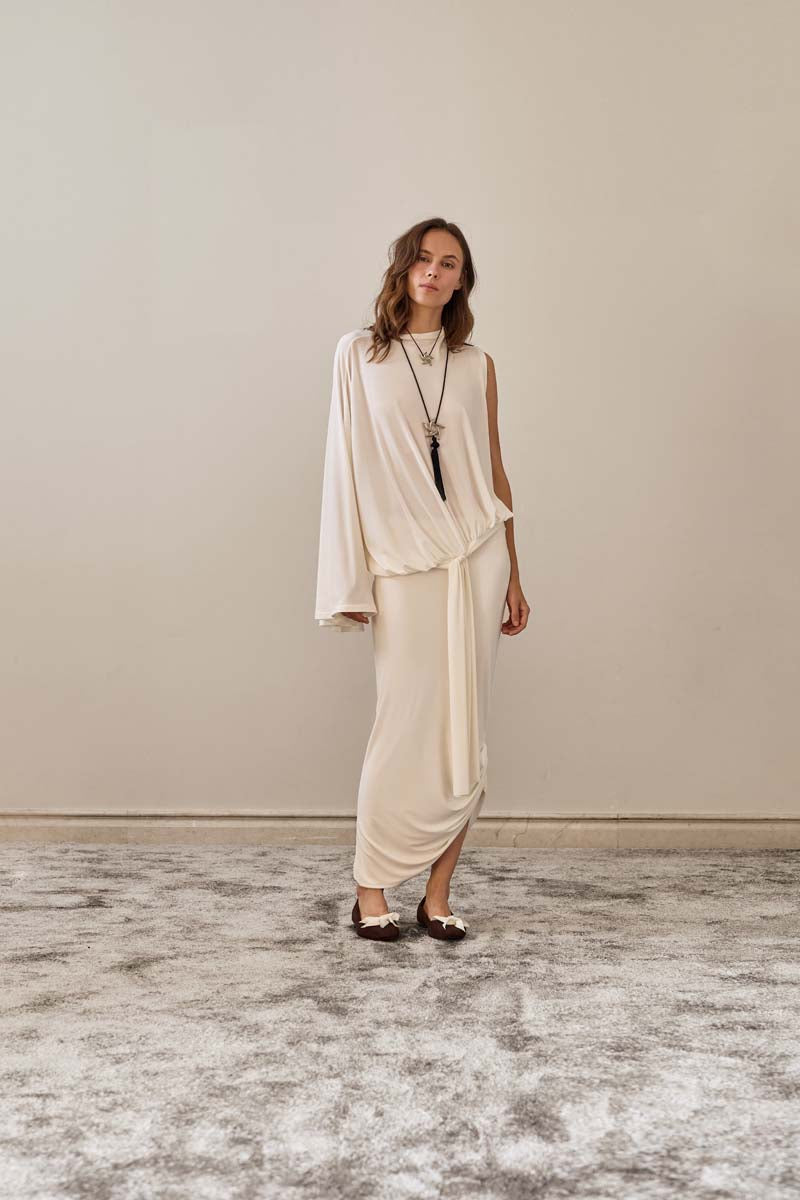 YASSMIN SALEH ivory drape top featuring elegant fabric and stylish design, front view showcasing its relaxed fit and sophisticated style.