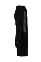Black draped overlay maxi skirt by Tayfun Kaba, featuring elegant flowing fabric and layered design.