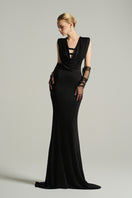 Black V-neck sleeveless gown by I.H.F Studio with draped cowl neckline and jersey fabric, full-length maxi dress.