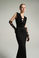 Black V-neck sleeveless gown by I.H.F Studio with draped cowl neckline and flowing jersey fabric.
