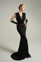 Black V-neck sleeveless gown by I.H.F Studio, featuring a draped cowl neckline and flowing jersey fabric.