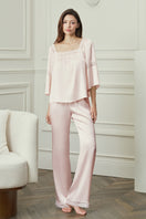 Pink DREAM women's pajama set by MANITO with a comfortable, cozy design perfect for relaxing at home.