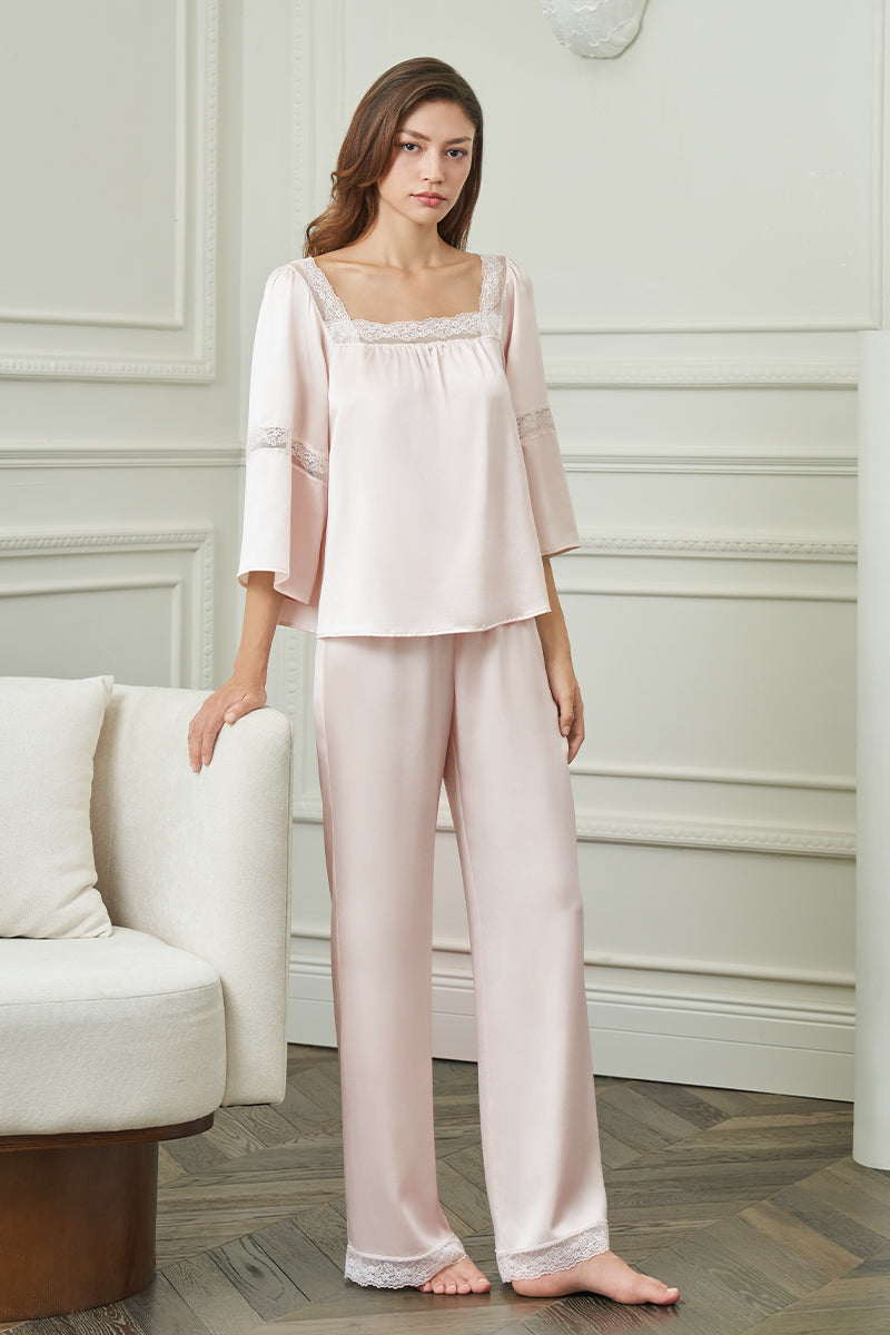 Pink DREAM women's pajama set by MANITO, featuring soft fabric and comfortable fit, ideal for lounging and sleep.