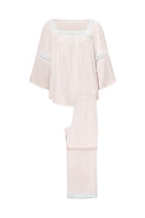 Pink DREAM women's pajama set by MANITO, featuring comfortable sleepwear with a soft fabric and relaxed fit.