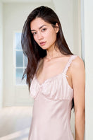 Pink silk chemise nightgown for women by MANITO, featuring smooth fabric and delicate straps, perfect for elegant sleepwear.