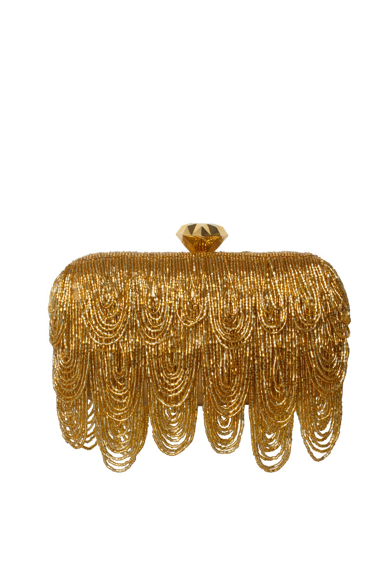 Gold Drip Box clutch by Sarah's Bag, stylish and compact accessory with a luxurious gold finish and intricate design.