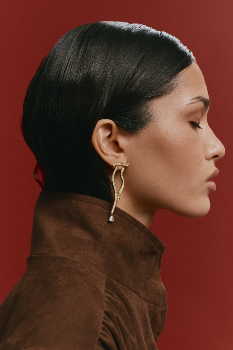 Gold Dune Mirage earrings by Velvet Desert featuring elegant drop design and intricate detailing.