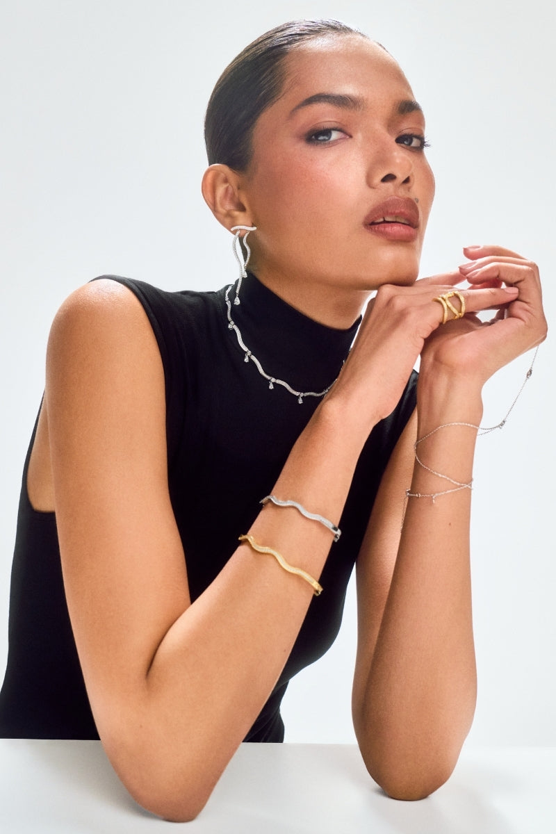 Silver Dune Mirage Long Drop Earring by Velvet Desert featuring elegant white design and intricate details.