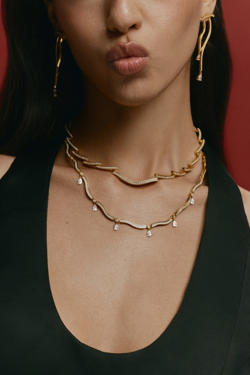 Gold Dune Mirage Necklace by Velvet Desert featuring intricate desert-inspired design on a delicate chain.
