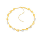 Gold Dune Rimal Necklace Satin Crest by Velvet Desert featuring intricate design and satin finish, displayed against a neutral background.