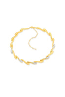 Gold Dune Rimal Necklace Satin Crest by Velvet Desert featuring intricate design and satin finish, displayed against a neutral background.